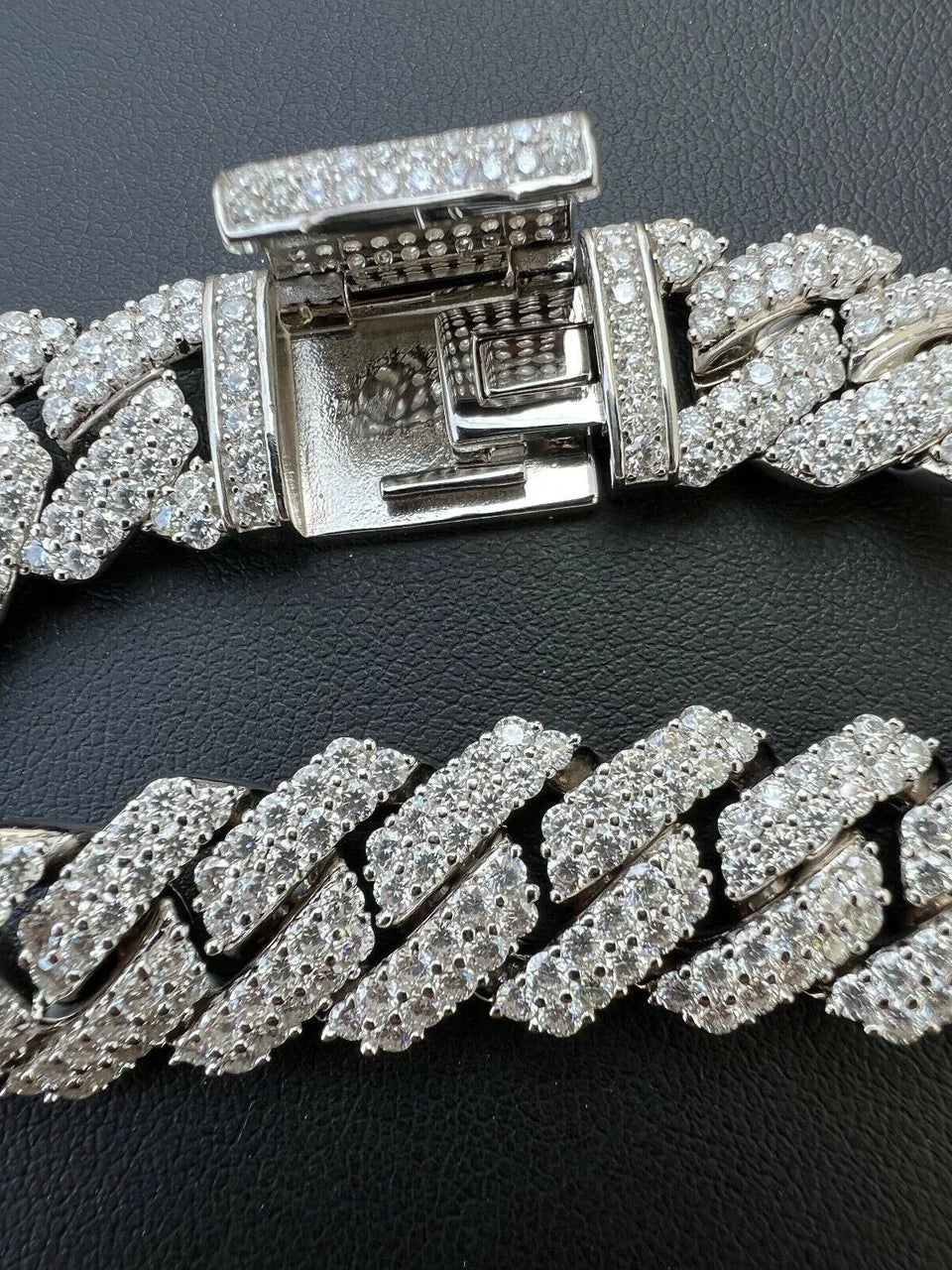 14mm iced out Cuban link chain close up of clasp and stone setting
