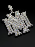 Custom overlapping monogram pendant with baguette and round VVS stones