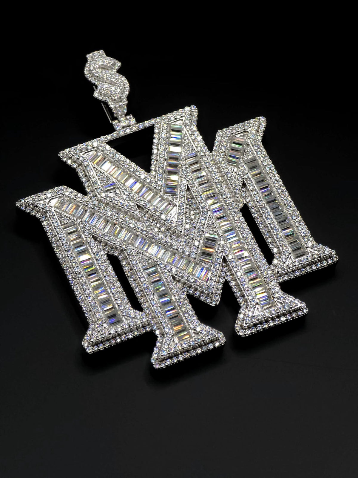 Custom overlapping monogram pendant with baguette and round VVS stones