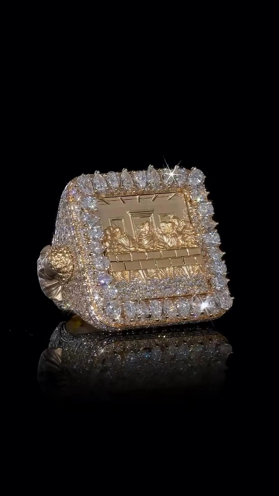 Last Supper statement ring with pear-cut stone halo