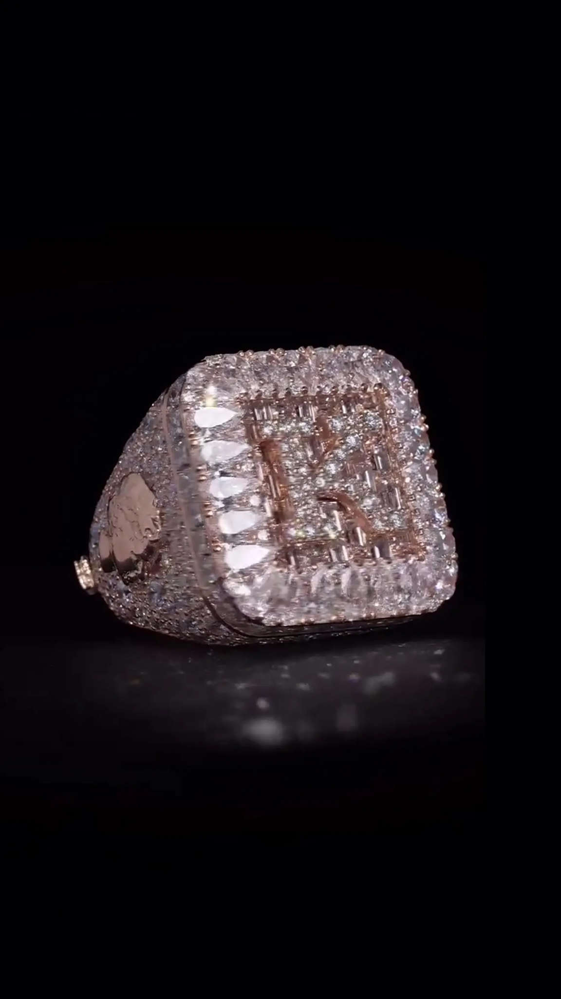 Custom double-number ring with pear-cut halo